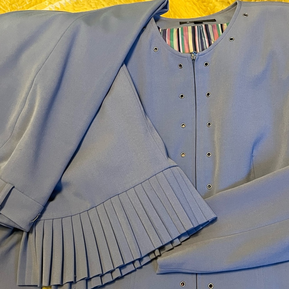 Three piece suit. Jacket, pants, skirt.